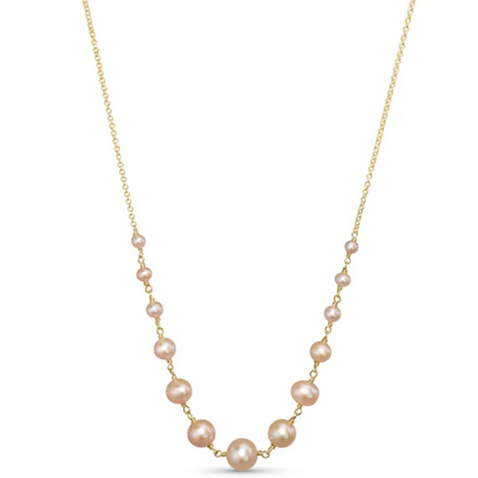 14k Pink Freshwater Pearl Wire Necklace from the Goddess Jewelry Collection  boasts a delicate chain with a central cluster of varying-sized pink pearls, creating an elegant and balanced design.