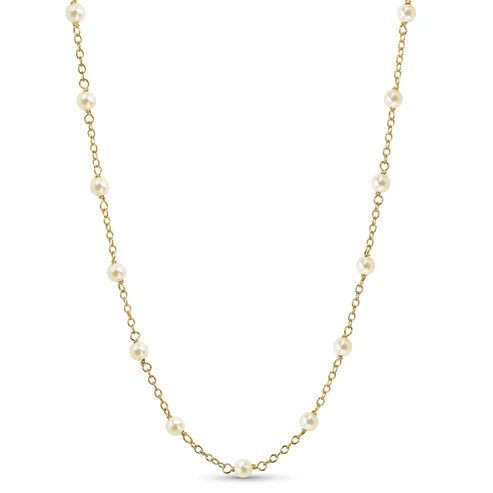 The 14k White Pearl Station Necklace  from the Goddess Jewelry Collection features a gold chain with evenly spaced white pearls, embodying elegance.