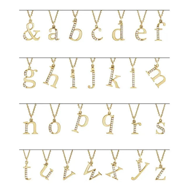 14K Dainty Lowercase Initial Diamond Necklaces  from the Goddess Jewelry Collection display pendants from A to Z, plus an ampersand. Each piece features a diamond-studded initial on a gold chain, perfect as personalized gifts. Four rows showcase the entire alphabet in lowercase letters.