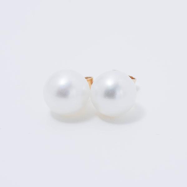 A close-up of Jewelmak's 14k White 9mm Freshwater Pearl Stud Earrings, featuring smooth pearls elegantly set on gold stud backs, against a light gray background.