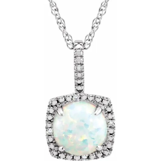 Explore the Goddess Jewelry collection with the Sterling Silver Lab-Grown White Opal Necklace. This piece features a square opal pendant with sparkling accents and an iridescent color mix, elegantly suspended on a silver chain, ideal for any occasion.