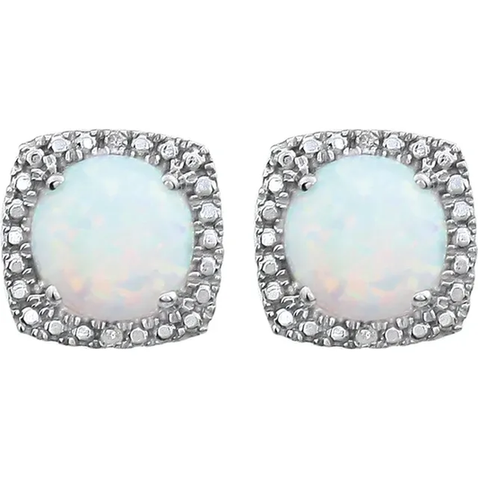Stuller's Sterling Silver Lab-Grown White Opal Earrings feature a central circular opal, surrounded by a square pavé diamond halo setting. The opals subtly play with color, while the sterling silver provides an elegant, reflective finish.
