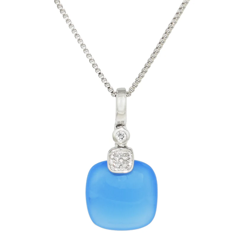 Sterling Silver White Topaz Blue Agate Necklace from the Goddess Jewelry Collection  features a pendant with a bright blue agate in a rounded square shape, topped by a sparkling white topaz set in silver, all elegantly hanging from a delicate square-link chain.