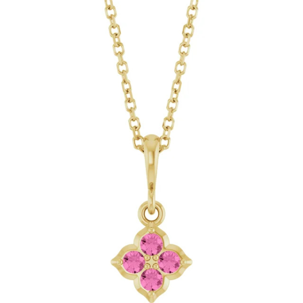 The Stuller Youth 14K Lab-Grown Pink Sapphire Necklace features a 14k yellow gold chain with a flower-shaped pendant of four lab-grown pink sapphires, polished bail, and intricate detailing for an elegant look.