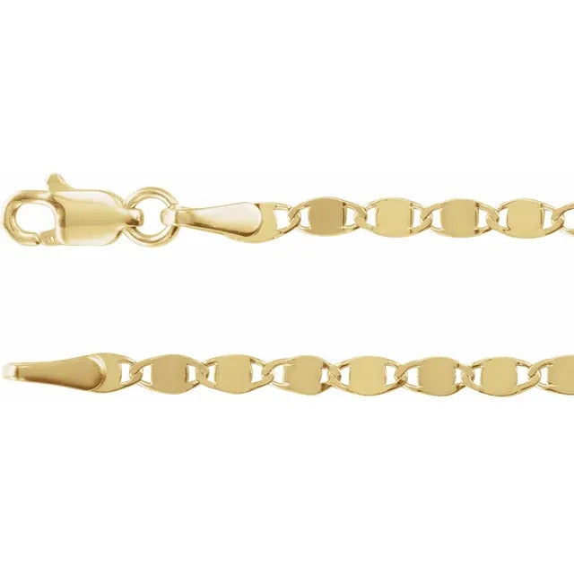 Introducing the elegant 14K Yellow 2.7 mm Mirror Necklace by Stuller, featuring small oval links crafted in polished mirror chain. The necklace includes a lobster clasp, emphasizing its secure fastening mechanism and refined design.