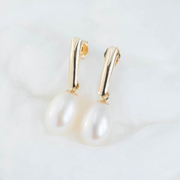 14K Yellow Gold Freshwater Pearl Drop Earrings, gracefully showcased against a soft, fluffy white backdrop.