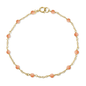 The Jewelmak 14k Pink Coral Station Bracelet is a delicate gold chain with small pink coral beads evenly spaced around it and features a round clasp for fastening.