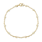 The Jewelmak 14k White Pearl Station Bracelet is a delicate gold chain with small white pearls set in a circular design and finished with a simple clasp.