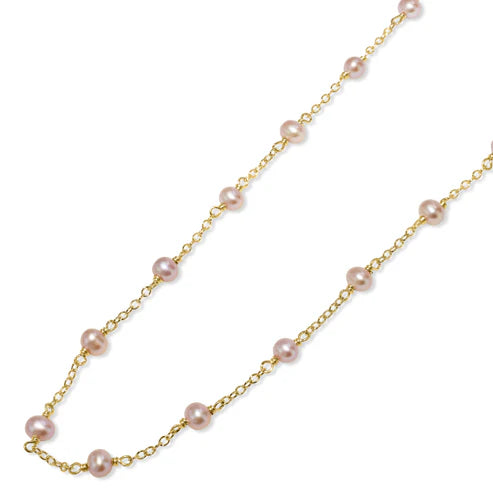 Discover Jewelmak's 14k Natural Pink Pearl Station Necklace: a luxurious gold chain adorned with spaced pink pearls. Its elegant yet simple design beautifully enhances any jewelry collection.