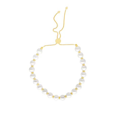 The Jewelmak 14K White Pearl Gold Adjustable Bolo Bracelet features elegant freshwater pearls with yellow gold spacers. Its adjustable chain and round clasp ensure a perfect fit, adding sophistication to any ensemble.