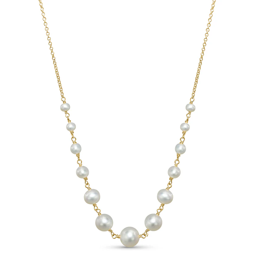 The Jewelmak 14k White Freshwater Pearl Wire Necklace showcases evenly spaced pearls of varying sizes in a graduated design, with larger pearls at the center and smaller ones toward the ends, beautifully displayed on a white background.