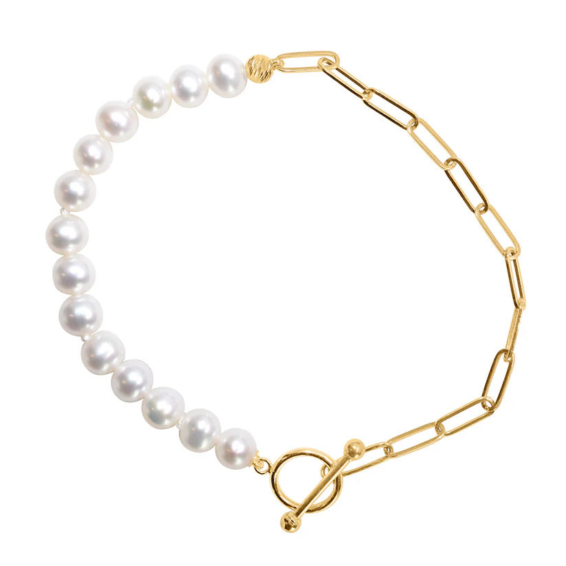 The Jewelmak 14k White Freshwater Pearl Paperclip Chain Toggle Bracelet, measuring 7.5 inches, is an elegant piece crafted from solid yellow gold and highlighted by a string of white freshwater pearls seamlessly connected to the chain with a toggle clasp, embodying timeless sophistication.