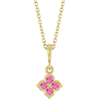 The Youth Lab-Grown Pink Sapphire 14K Yellow Gold Necklace features a chain with a floral-inspired pendant, showcasing lab-grown pink sapphires shaped like a four-petaled flower.