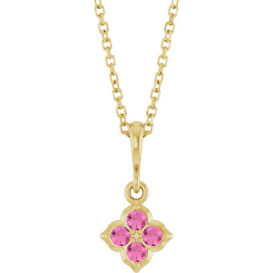 The Youth Lab-Grown Pink Sapphire 14K Yellow Gold Necklace features a chain with a floral-inspired pendant, showcasing lab-grown pink sapphires shaped like a four-petaled flower.